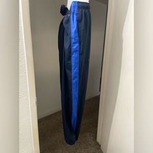 Large Blue drawstring Nike wind pants